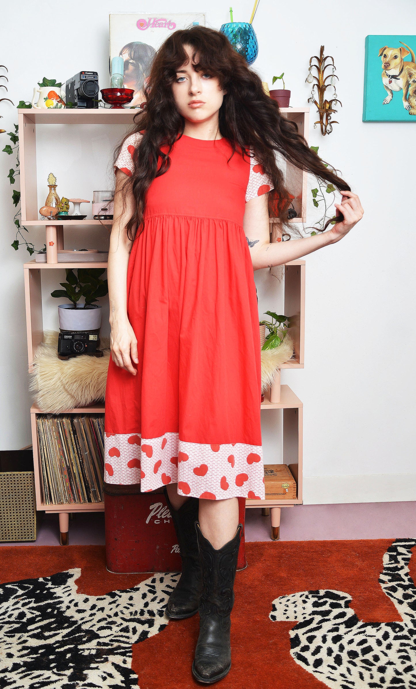 Front view of 1970s homespun junior dress with heart print sleeves and “love” trim, vintage Raggedy Ann style Lovers Vintage and Palomino Traders Collab